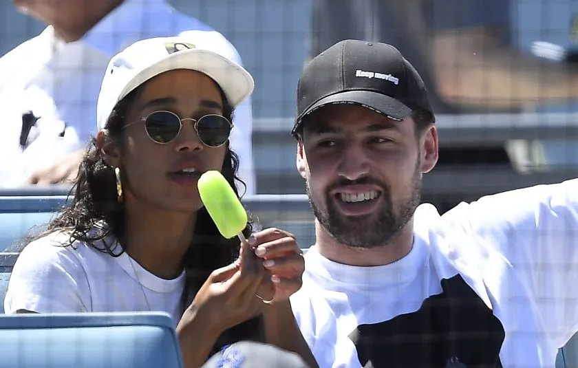 Klay Thompson and Laura Harrier at a Dodgers game in 2019.