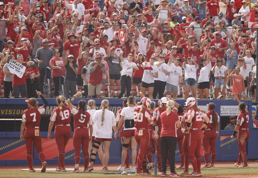Oklahoma fans cheer on their team during the fifth inning of Game 13 of the Women's College World Series against James Madison on June 07, 2021.