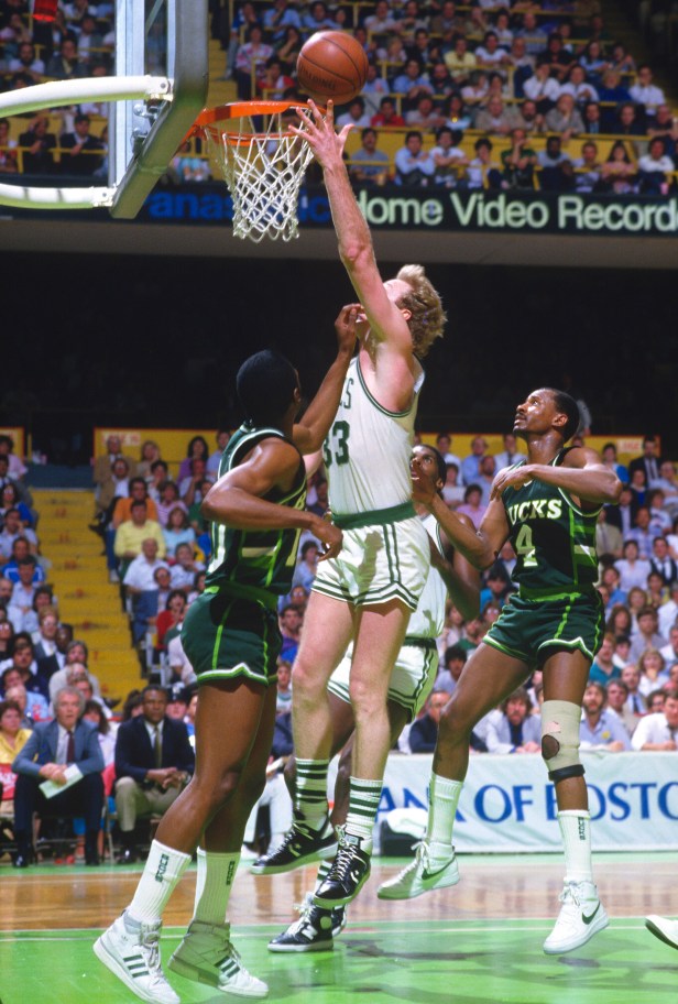 Larry Bird attempts a shot against the Bucks in 1984.