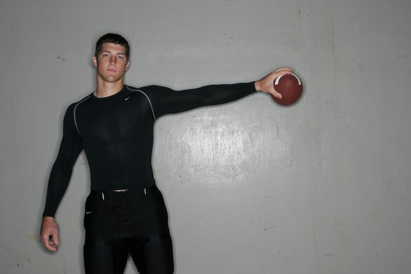 Tim Tebow poses for a photo back in high school.
