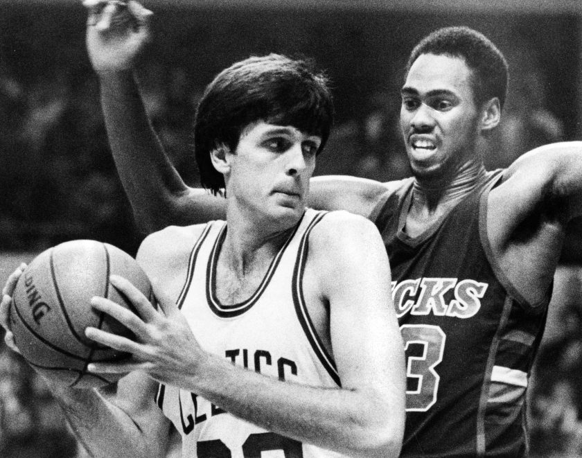 Milwaukee Bucks Alton Lister, right, closely guards Boston Celtics Kevin McHale, in 1983.
