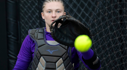 Lauren Bernett catches a pitch during a 2021 JMU softball game.