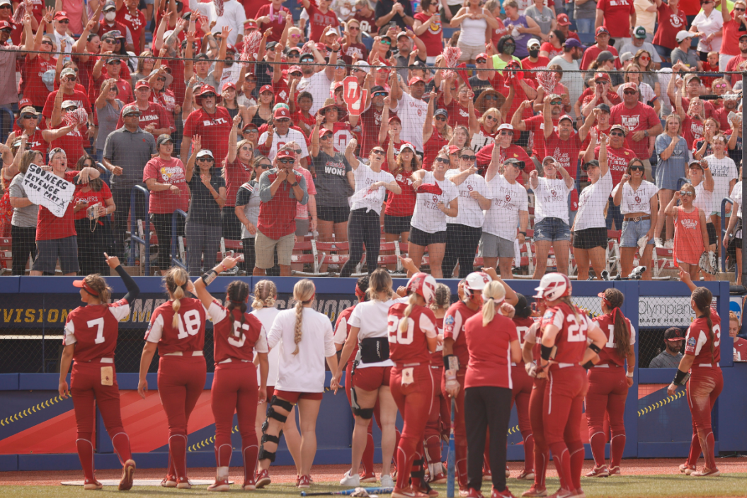 Oklahoma fans cheer on their team during the fifth inning of Game 13 of the Women's College World Series against James Madison on June 07, 2021.