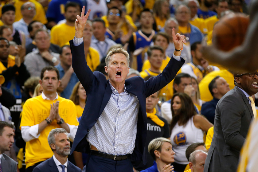 Golden State Warriors head coach Steve Kerr instructs his team during the 2017 NBA Finals.