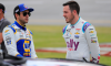 Chase Elliott talks with Alex Bowman before the running of the NASCAR Cup Series GEICO 500 race on April 24, 2022 at Talladega Superspeedway in Talladega, Alabama