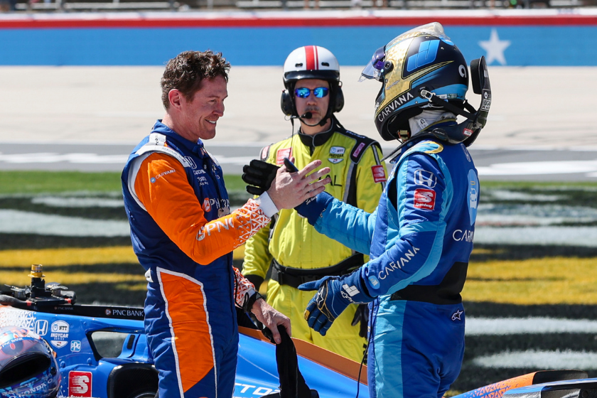 chip ganassi racing teammates scott dixon and jimmie johnson shake hands at march 2022 texas motor speedway race