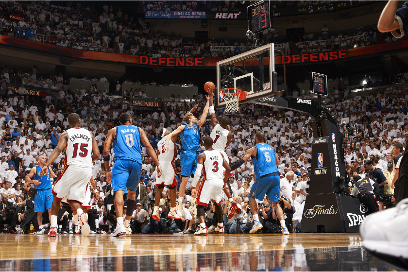 Dirk Nowitzki drives the ball against the Miami Heat in Game 6 of the 2011 NBA Finals.