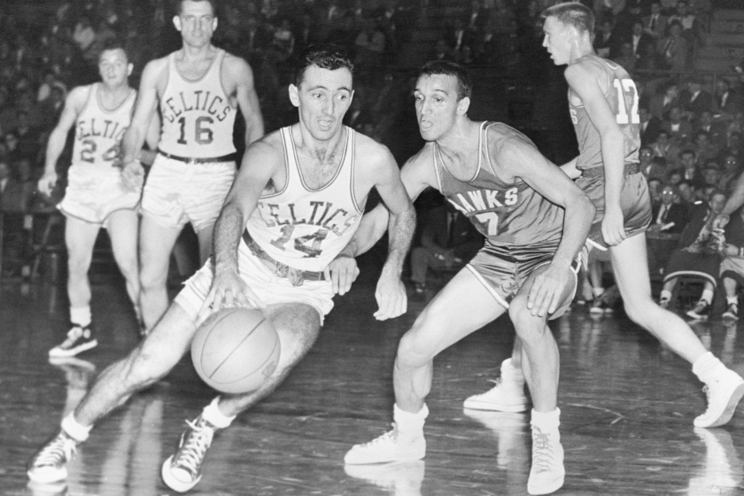Bob Cousy drives to the hoop as a member of the Boston Celtics