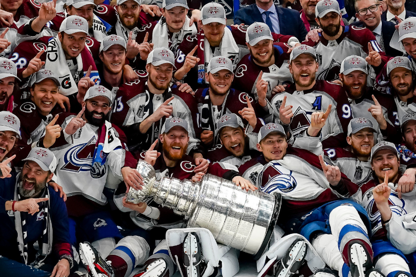 The Colorado Valanche pose for a group photo after denting the Stanley Cup