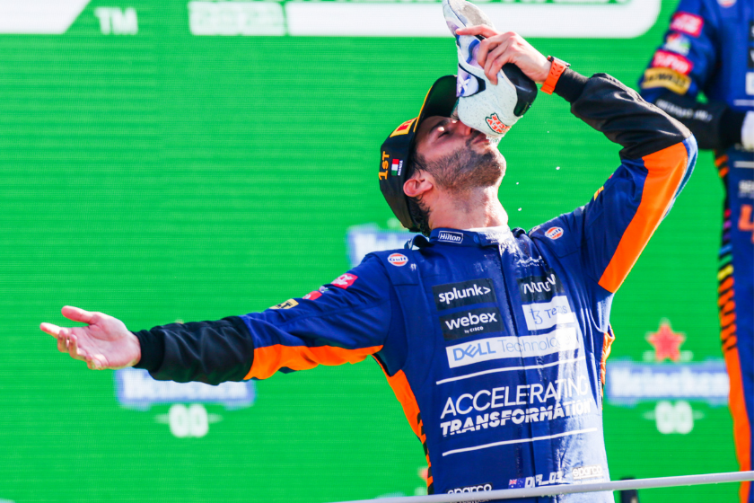 Daniel Ricciardo doing a shoey after winning the F1 Grand Prix of Italy at Autodromo di Monza on September 12, 2021 in Monza, Italy