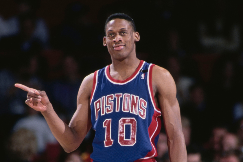 Dennis Rodman reacts to a play as a member of the Detroit Pistons