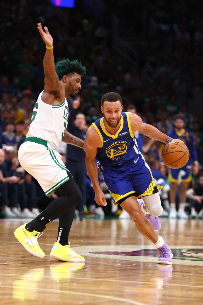 Steph Curry drives against Marcus Smart in the 2022 NBA Finals.