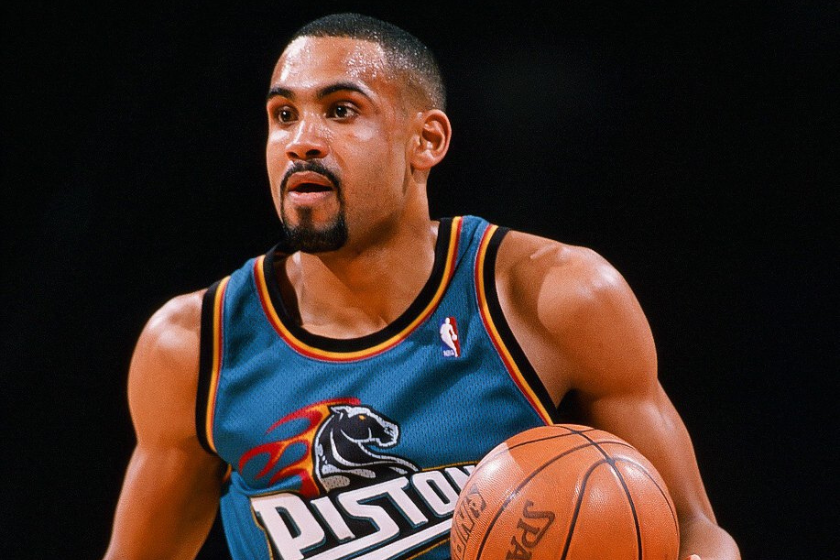 Grant Hill handles the ball for the Detroit Pistons