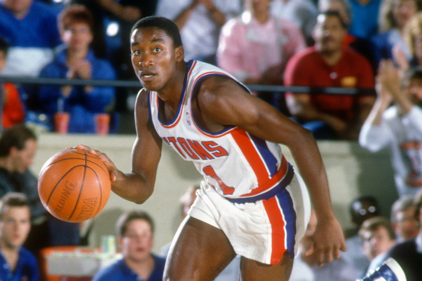 Isiah Thomas takes the ball up the court for the Detroit Pistons