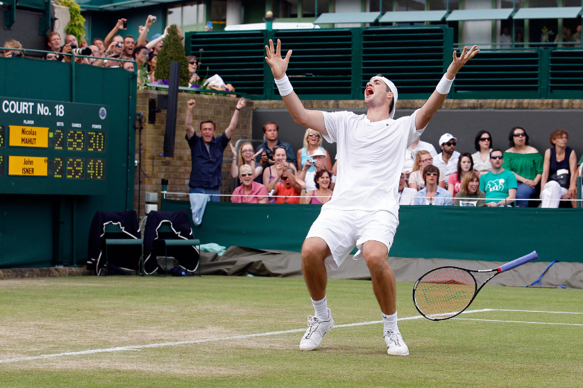 John Isner reacts to winning the longes tennis match in history at Wimbledon in 2010. 