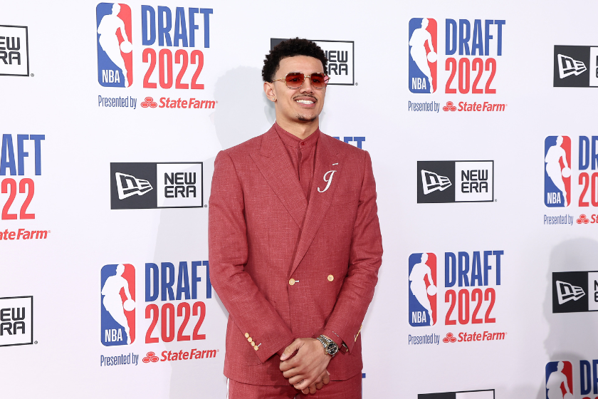 Johnny Davis poses on the Red Carpet ahead of the 2022 NBA Draft.
