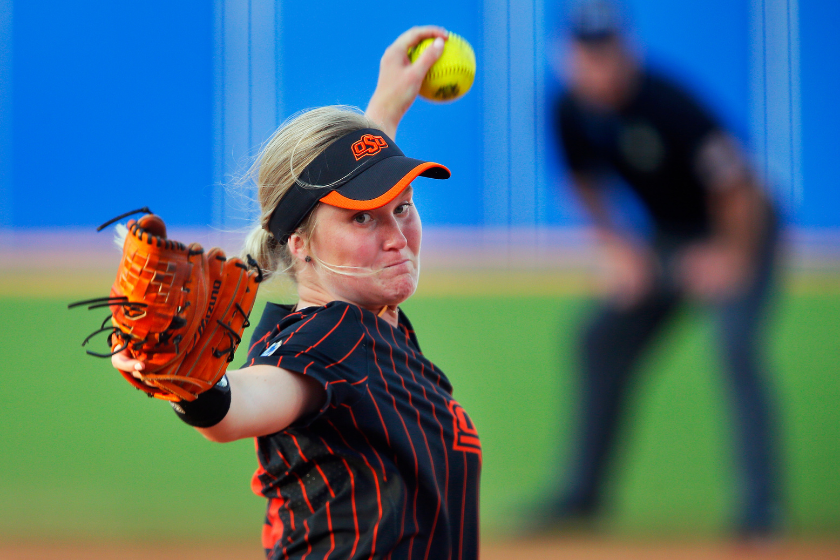 Kelly Maxwell throws a pitch against the Florida Gators in the Women's College World Series