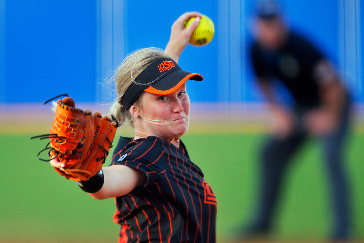 Kelly Maxwell throws a pitch against the Florida Gators in the Women's College World Series