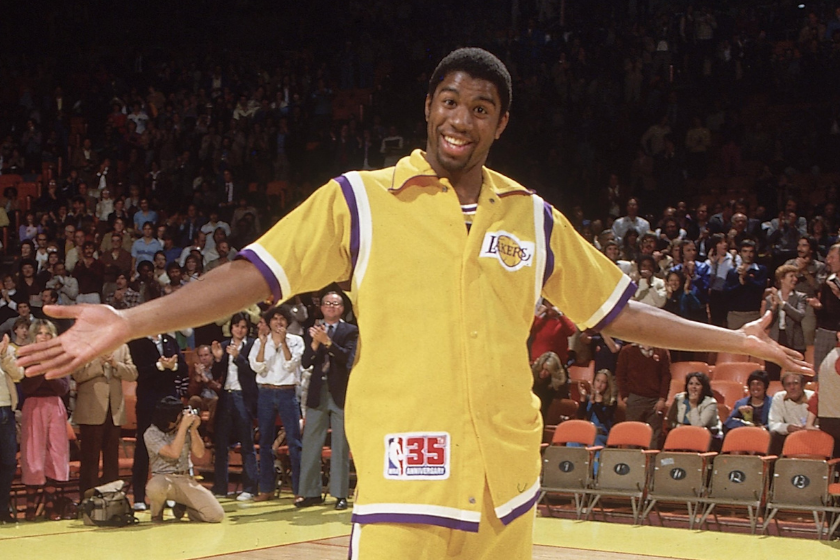 Magic Johnson during Player introductions before his return after a knee injury.