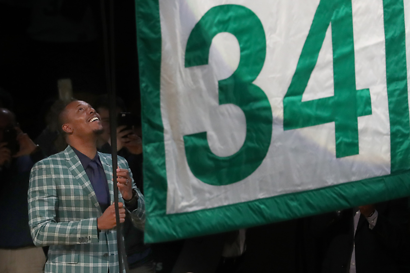 Pul Pierce helps raise his #34 to the TD Garden rafters. 