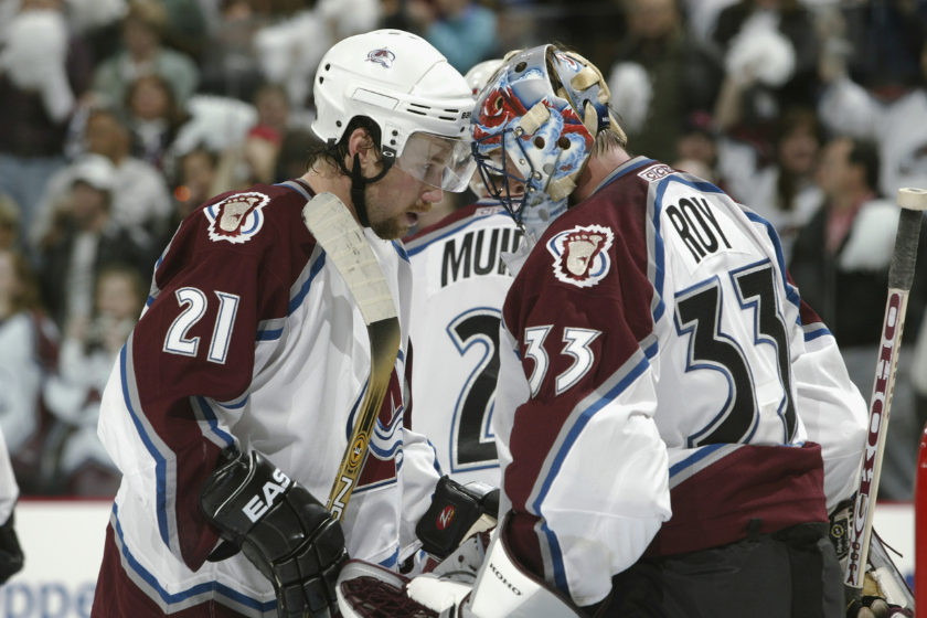Peter Forsberg and Patrick Roy share a moment in the Stanley Cup Playoffs. 