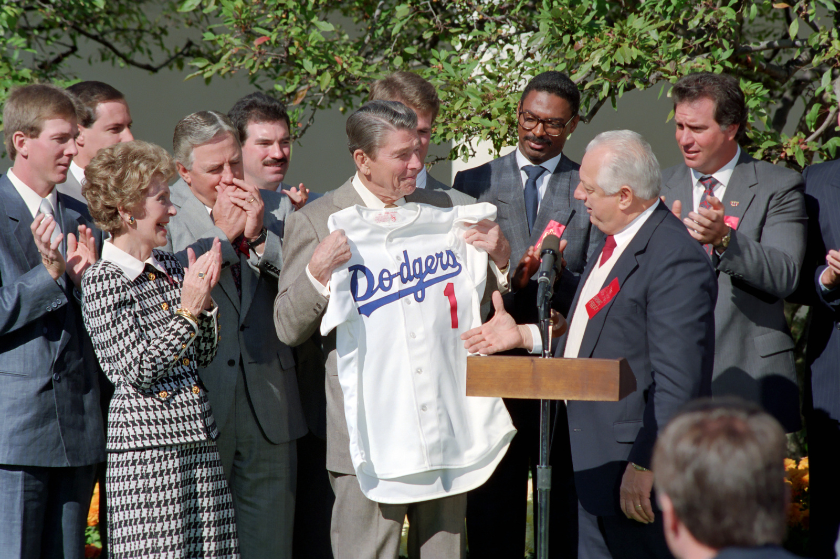 Dodgers Manager Tommy Lasorda presents PResident Ronald Reagan with a Dodgers jersey.