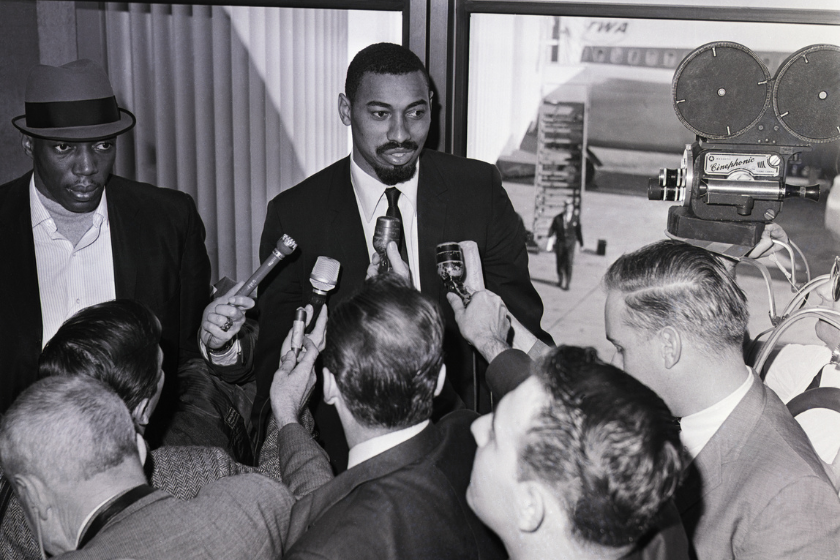 Wilt Chamberlain answer questions at the San Francisco Airport