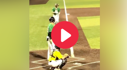 A high school baseball player stole home as the catcher stood there frozen with the ball.