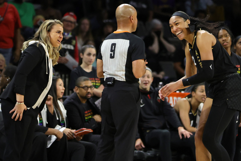 Las Vegas Aces head coach Becky Hammon and Aces' star A'ja Wilson argue a call with a WNBA ref