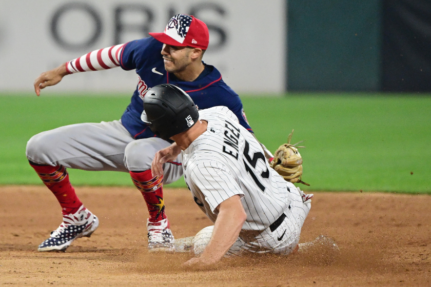 Minnesota Twins shortstop Carlos Correa tags out Chicag White Sox outfielder Adam Engel