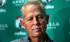Danny Ainge listens to a reporter's question during an open practice at TD Garden