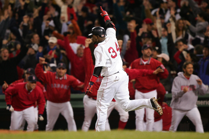 David Ortiz #34 celebrates after hitting the game winning two-run home run against the New York Yankees in the twelfth inning during game four of the American League Championship Series