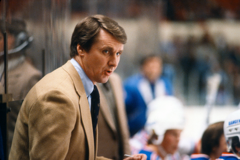 Herb Brooks looks on during an NHL game in 1981. 
