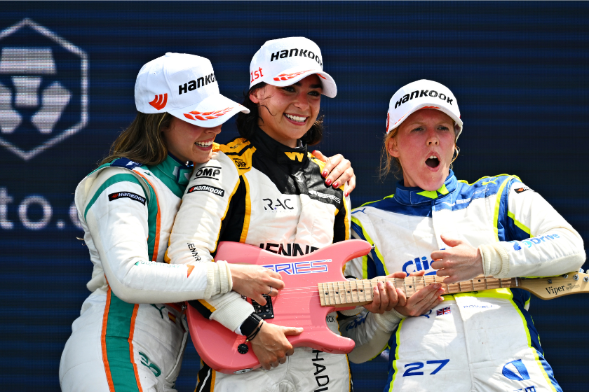 Jamie Chadwick, Nerea Marti, and Alice Powell celebrate on the podium during race 2 of W Series Round 1 at Miami International Autodrome on May 08, 2022