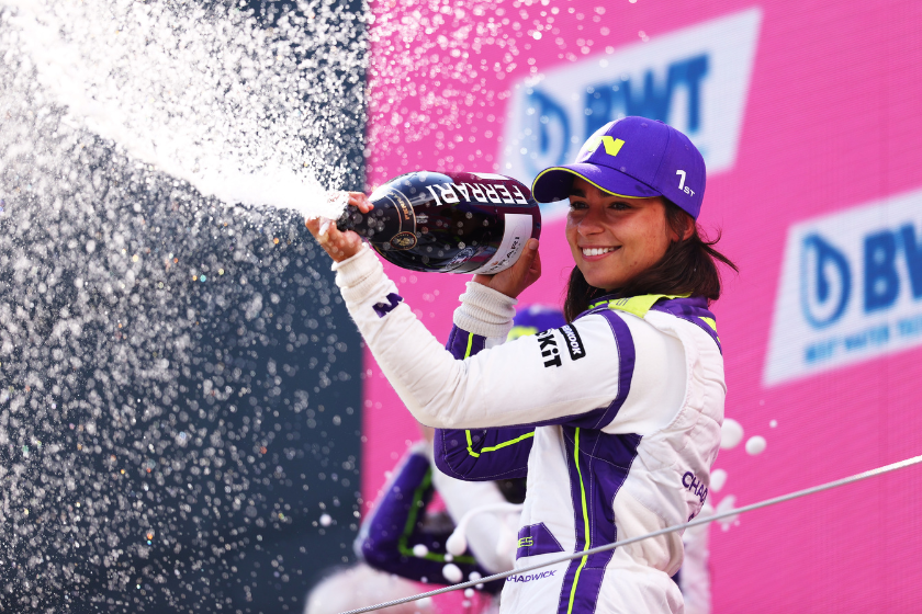 Jamie Chadwick celebrates on the podium during the W Series Round 2 race at Red Bull Ring on July 03, 2021 in Spielberg, Austria