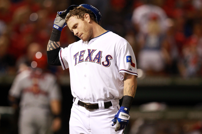  Josh Hamilton #32 of the Texas Rangers reacts after making the last out of the third inning during Game Three of the MLB World Series against the St. Louis Cardinals