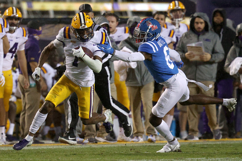 Kayshon Battle runs with the ball forfor LSU.