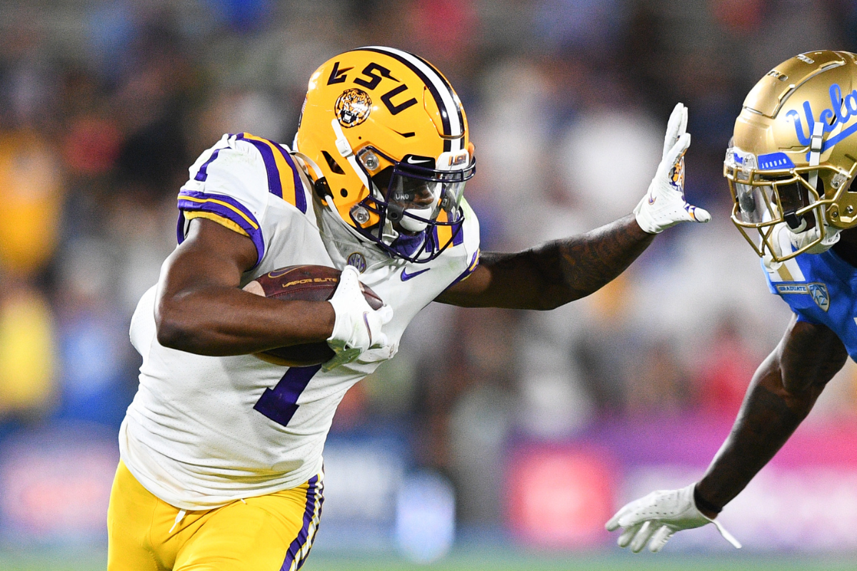 LSU Tigers Wide Receiver Kayshon Boutte (1) battles with UCLA Bruins defensive back Mo Osling III (7) during a college football game between the LSU Tigers and the UCLA Bruins