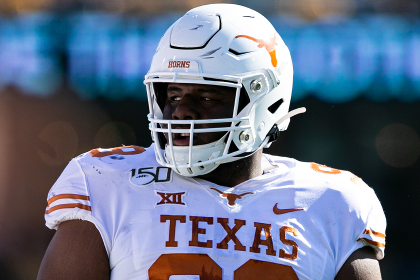 Texas Longhorns defensive lineman Keondre Coburn looks on during the College football game between the Texas Longhorns and the West Virginia Mountaineers 