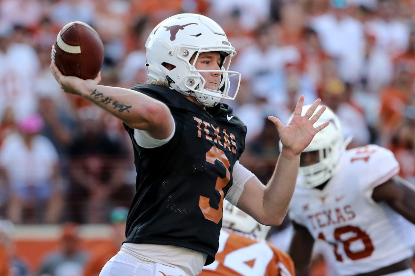 QB Quinn Ewers of the Texas Longhorns throws a pass during the Orange-White Spring Game