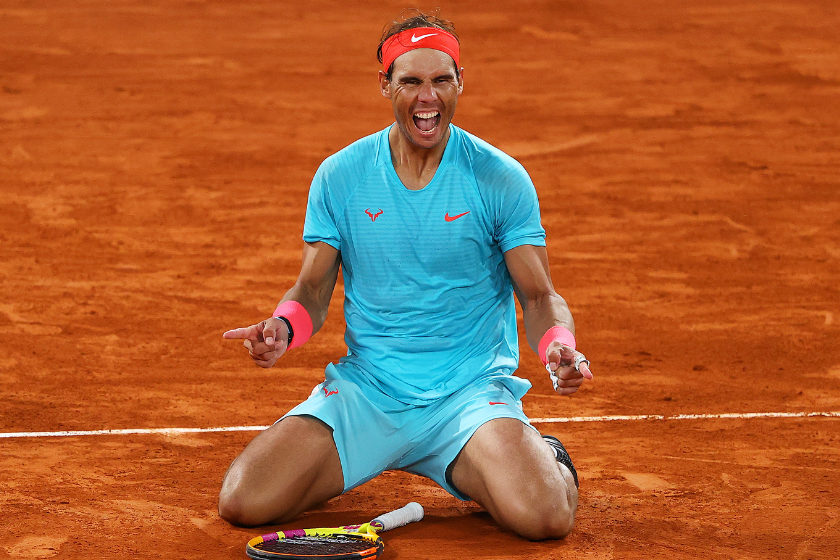 Rafael Nadal reacts to winning the 2022 French Open