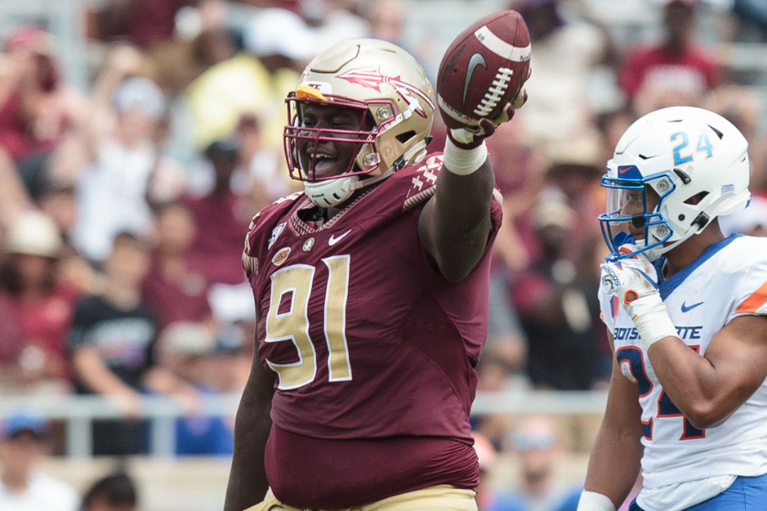 Robert Cooper of the Florida State Seminoles celebrates after recovering a fumble during the game against the Boise State Broncos.