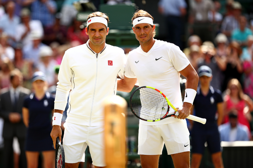 Roger Federer and Rafael Nadal take a photo before their 2019 Wimbledon semifinals match