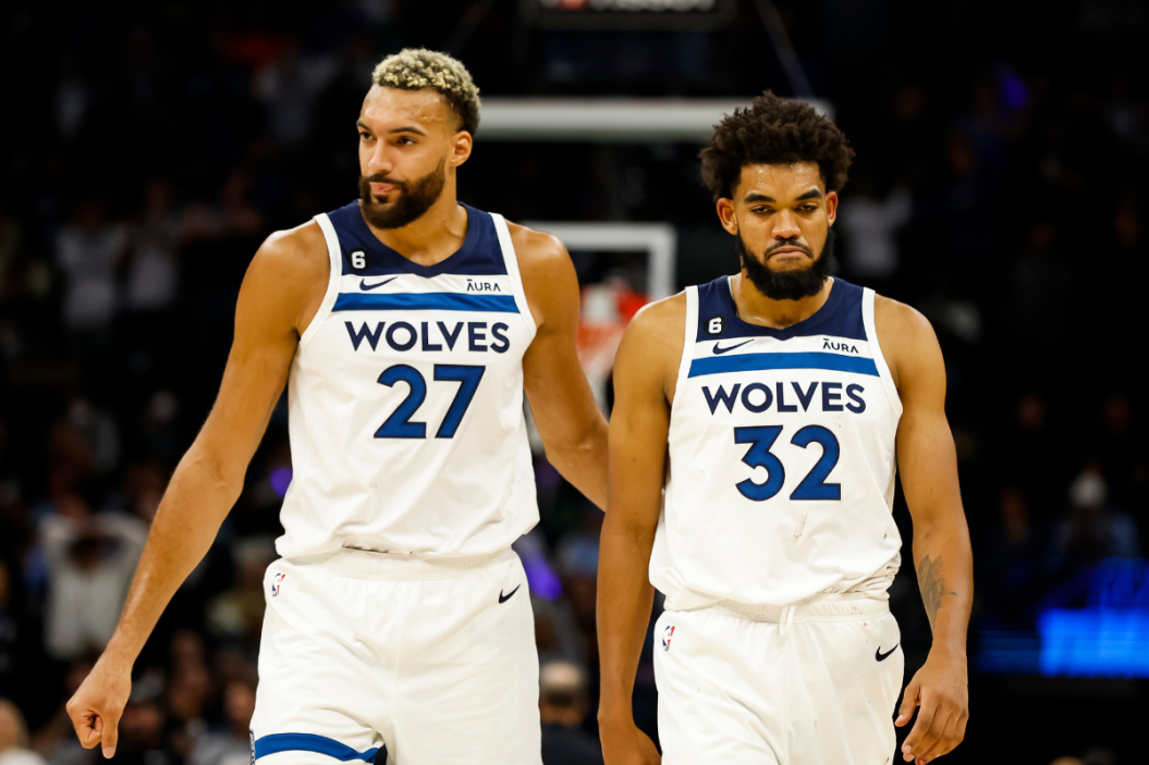 Rudy Gobert #27 talks to Karl-Anthony Towns #32 of the Minnesota Timberwolves in the fourth quarter of the game against the Oklahoma City Thunder at Target Center