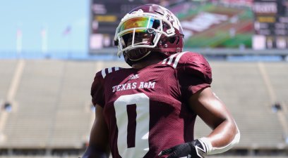 Ainias Smith of the Texas A&M Aggies runs after a play during the second half of the spring game