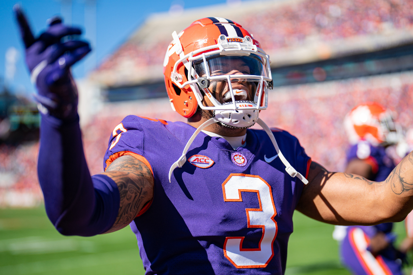 Xavier Thomas of the Clemson Tigers pumps up the crowd at the start of their game against the Connecticut Huskies.