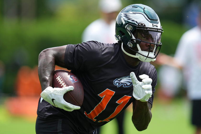 A.J. Brown #11 of the Philadelphia Eagles runs with the ball during OTAs at the NovaCare Complex