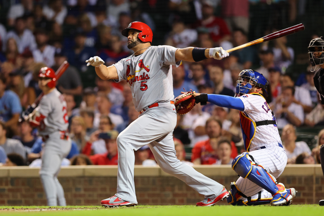 Albert Pujols hits a home run against the Chicago Cubs.