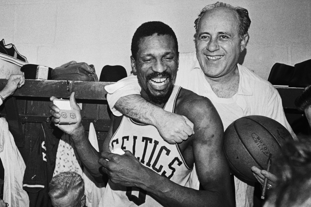 A happy twosome shown here, is Red Auerbach who coached his last Celtic's game that won their 8th straight NBA playoff championship