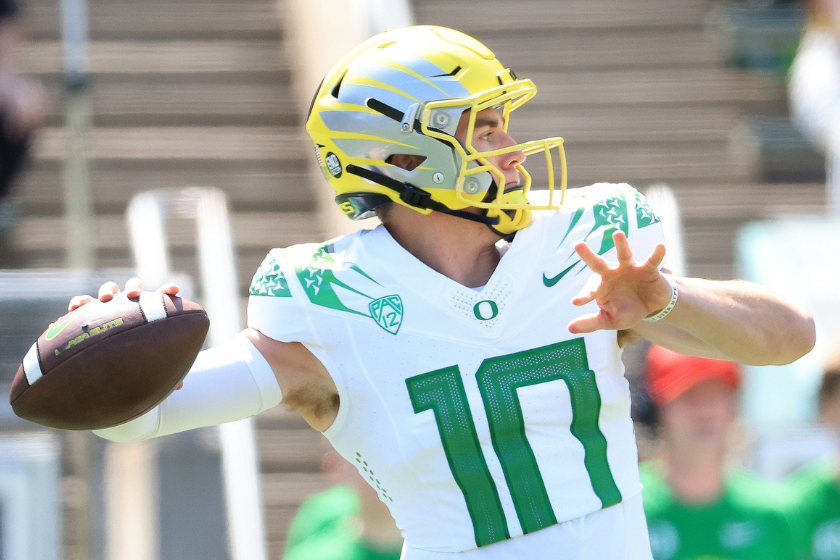 Bo Nix #10 of Team Yellow throws a pass against Team Green during the first quarter of the Oregon Spring Game